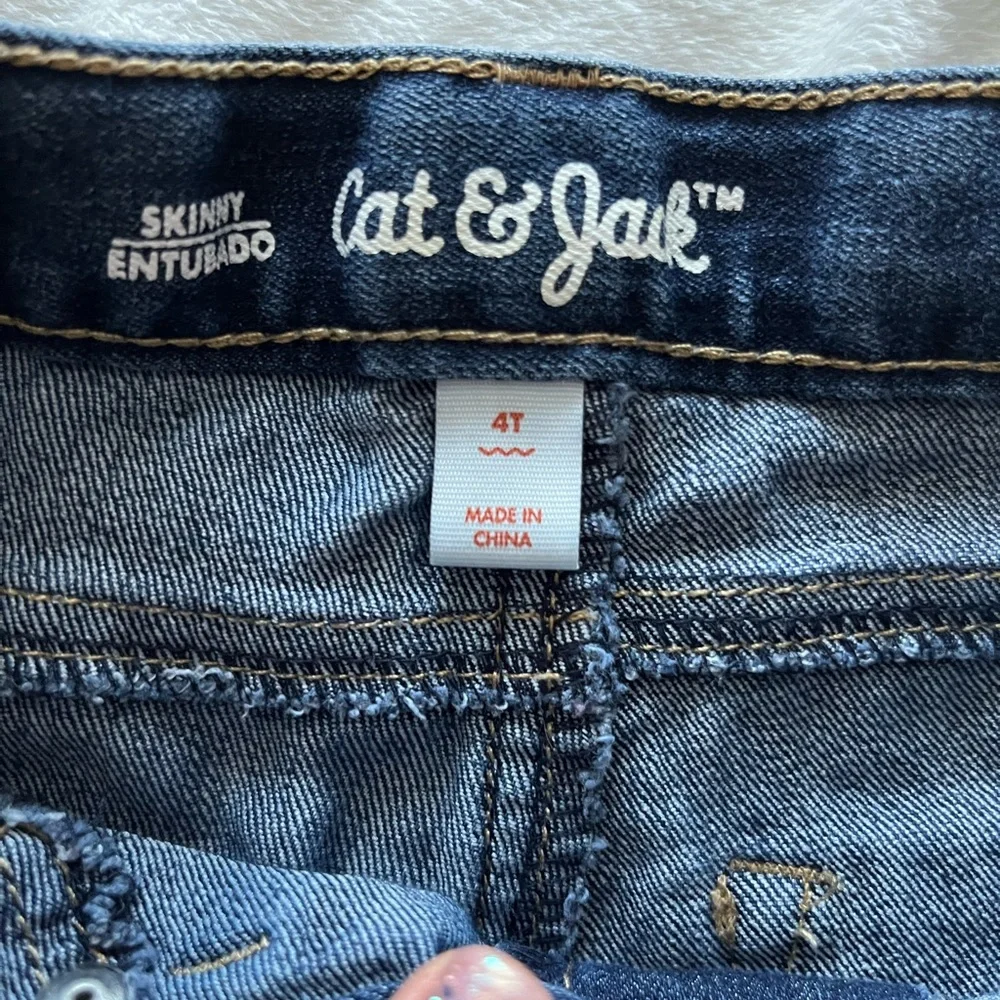 Cat & Jack kids blue jeans size 4T. Gold stitching around pockets.